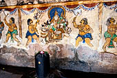 The great Chola temples of Tamil Nadu - The Brihadishwara Temple of Thanjavur. Linga with Nayaka painting on the inside wall of the cloister. 